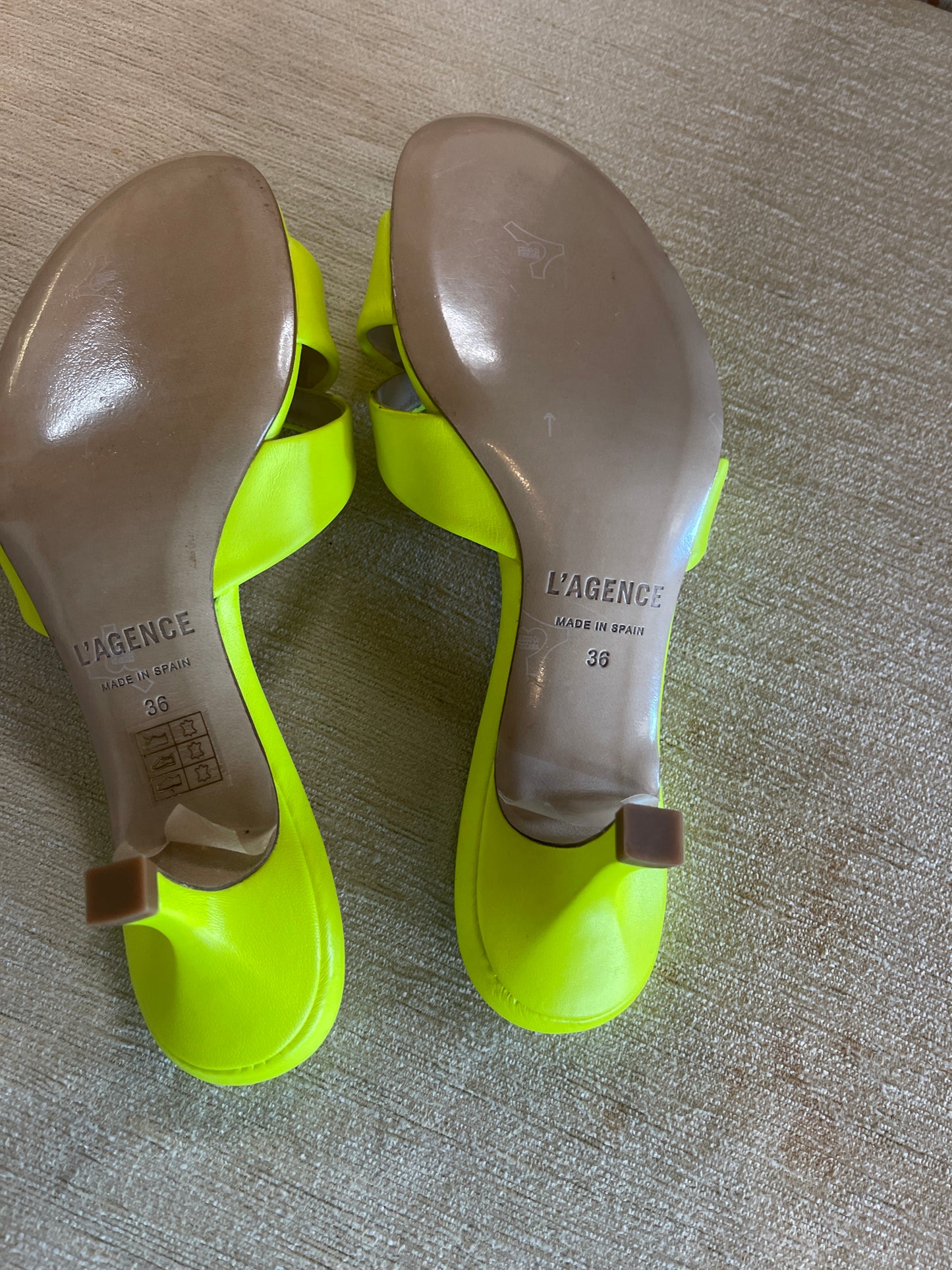 L'Agence Alesia criss-cross slide sandals in neon yellow leather