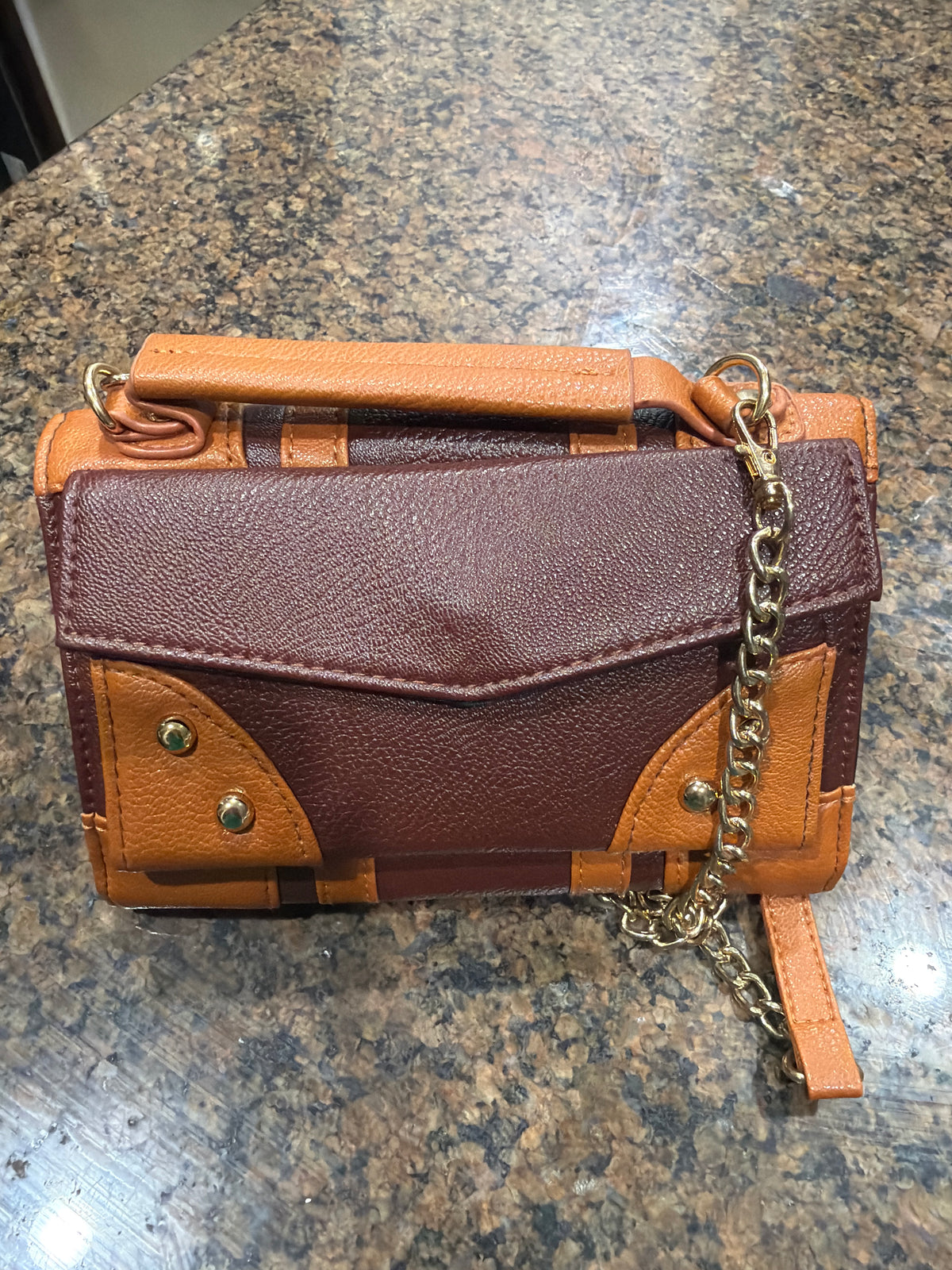 Harry Potter "School of Witchcraft and Wizardry" trunk-style crossbody bag and wallet hybrid.