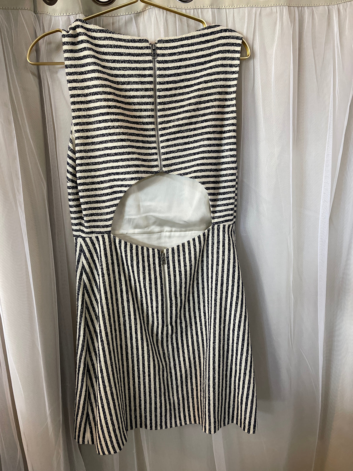 The Alice + Olivia sleeveless striped mini dress
