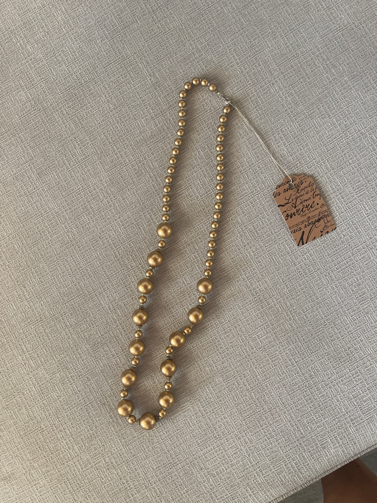 Elegant Long golf-tone necklace