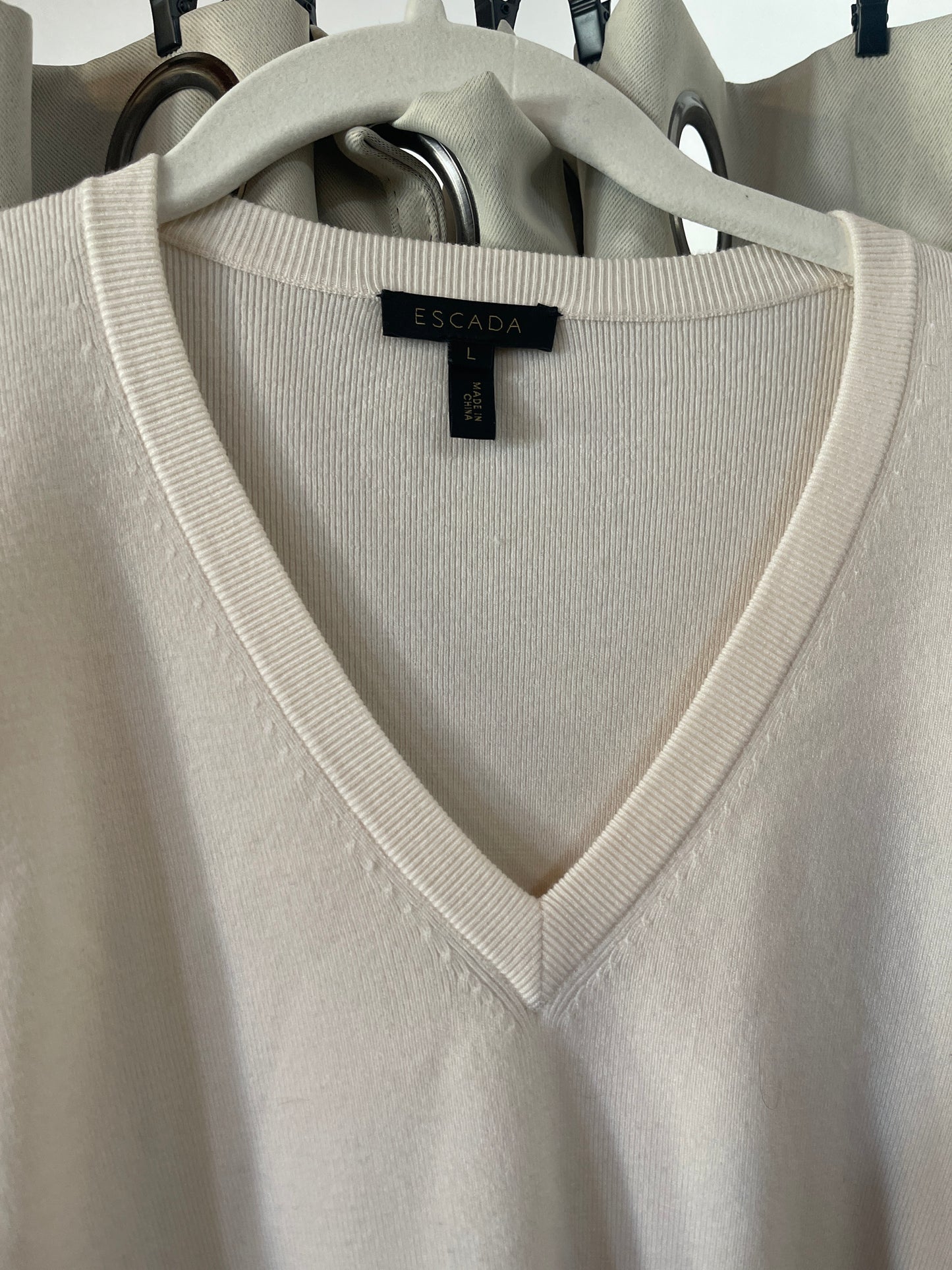 ivory V-neck sweater