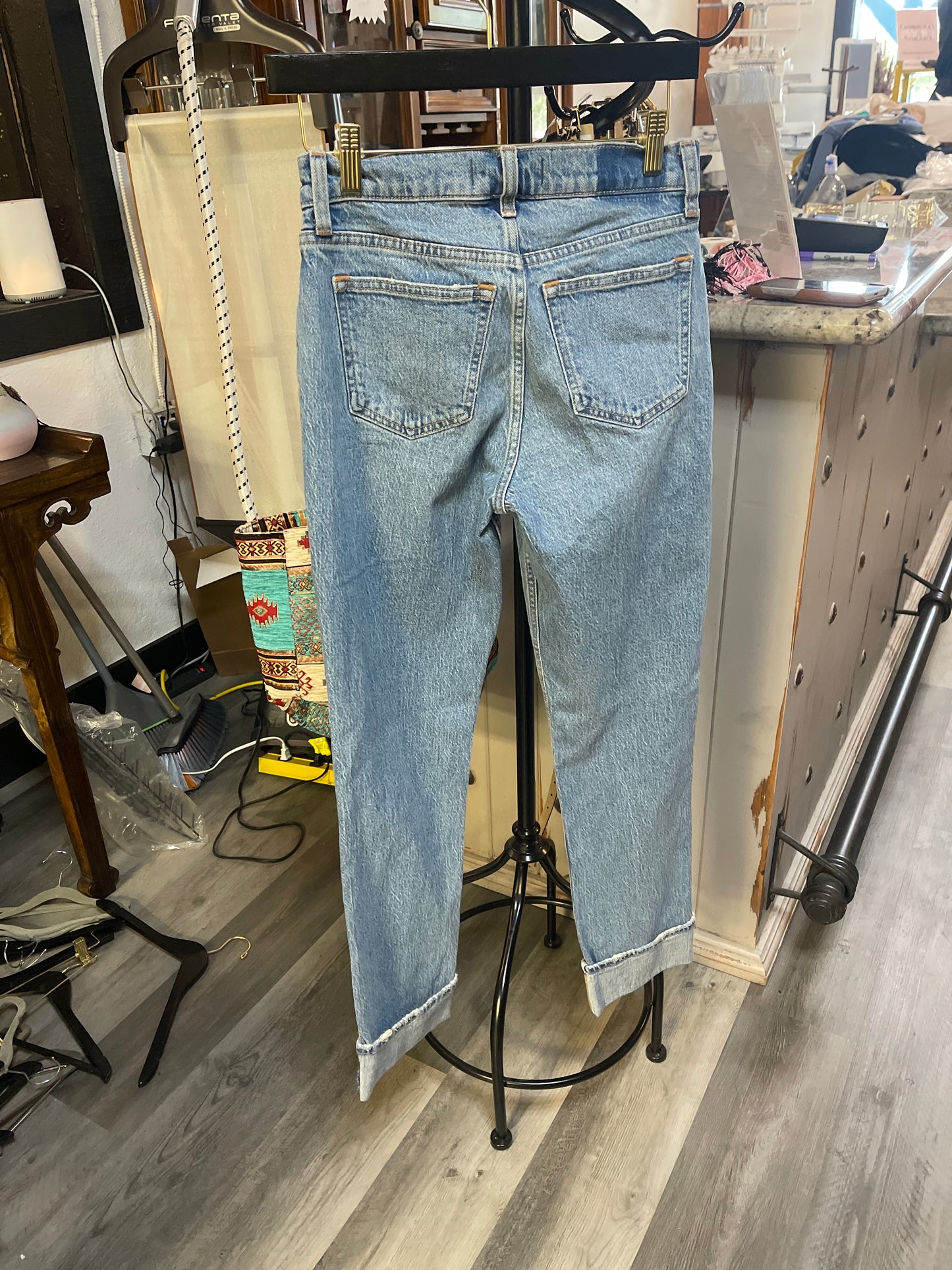 These light-wash cuffed straight-leg jeans by Abercrombie & Fitch feature a classic high-rise fit and a relaxed silhouette.