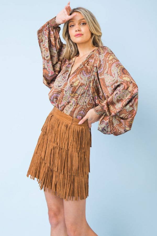 A faux suede mini skirt: CAMEL