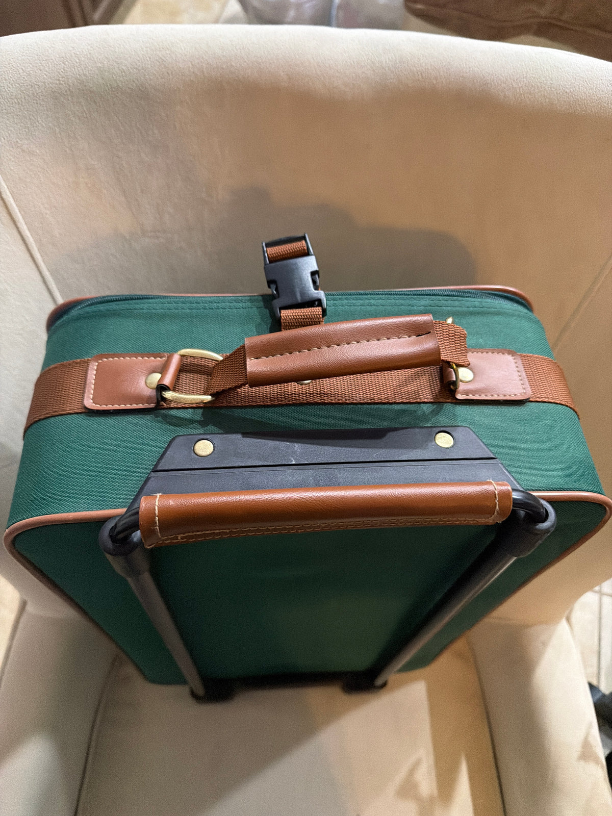 Vintage 1980s Polo Ralph Lauren green canvas roller suitcase.