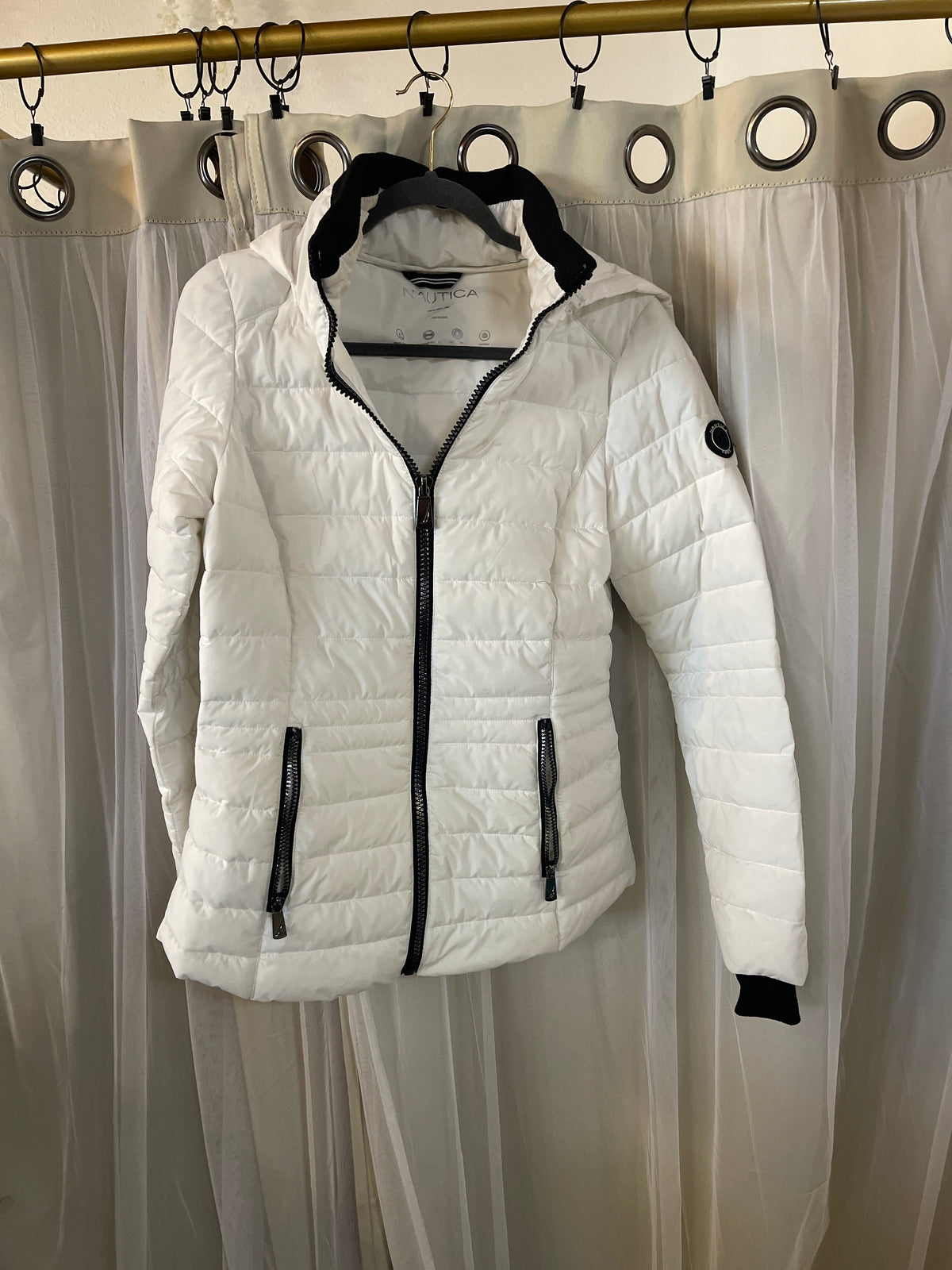 Nautica Women's Short Stretch Packable Jacket with Hood in a winter white colorway
