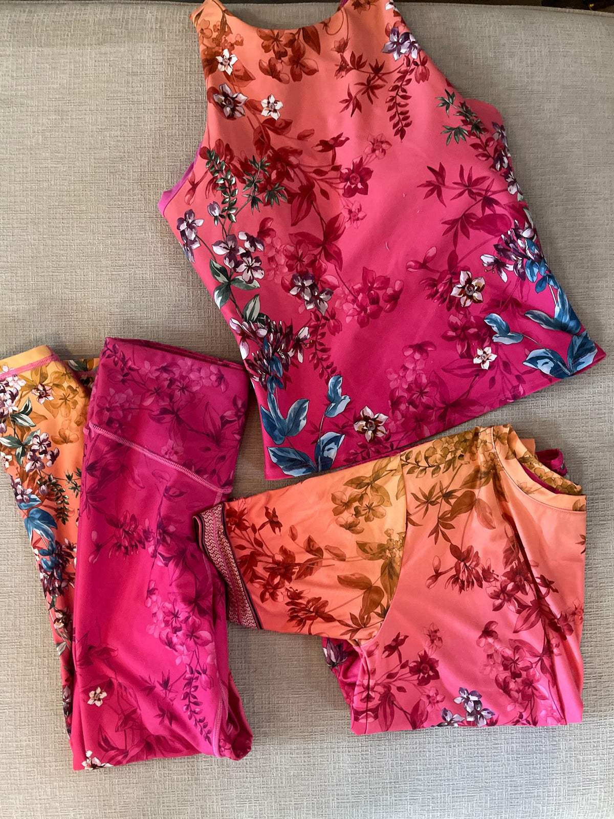 Johnny Was Active collection in the vibrant "Emboy" gradient floral pattern.