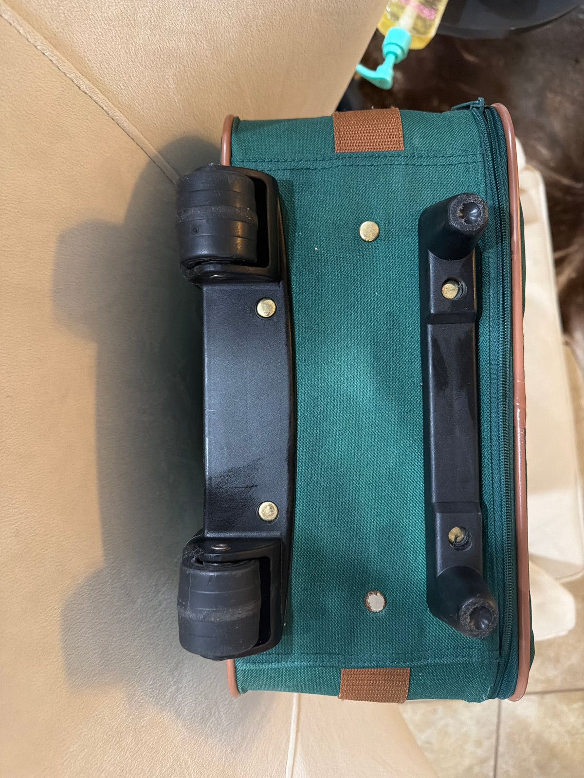 Vintage 1980s Polo Ralph Lauren green canvas roller suitcase.