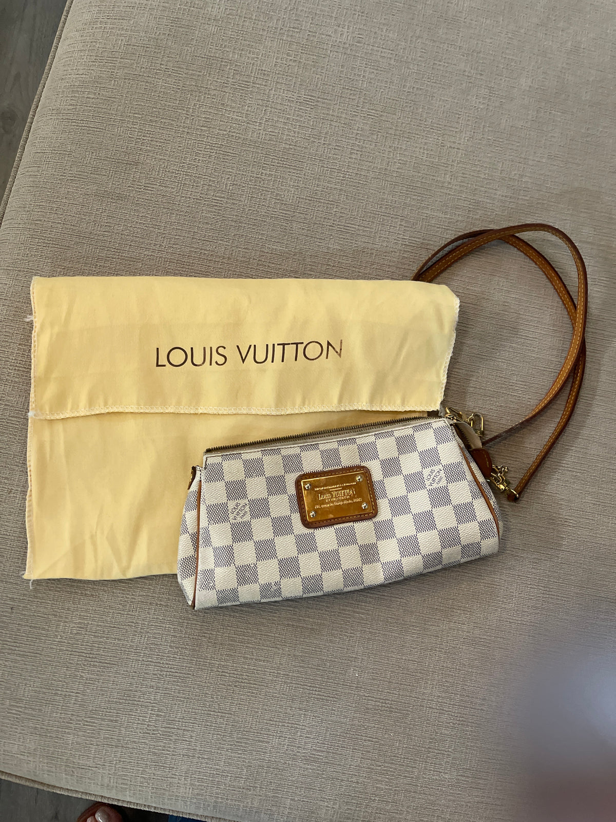 Louis Vuitton Damier Azur Eva Clutch.