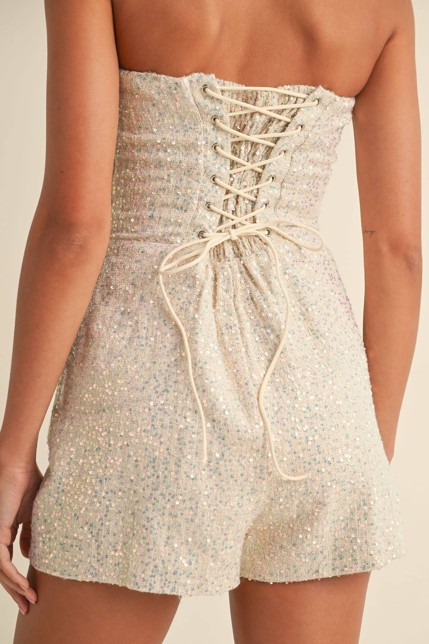 IR2136 SEQUINS TWEED LACE UP BACK STRAPLESS ROMPER: Black