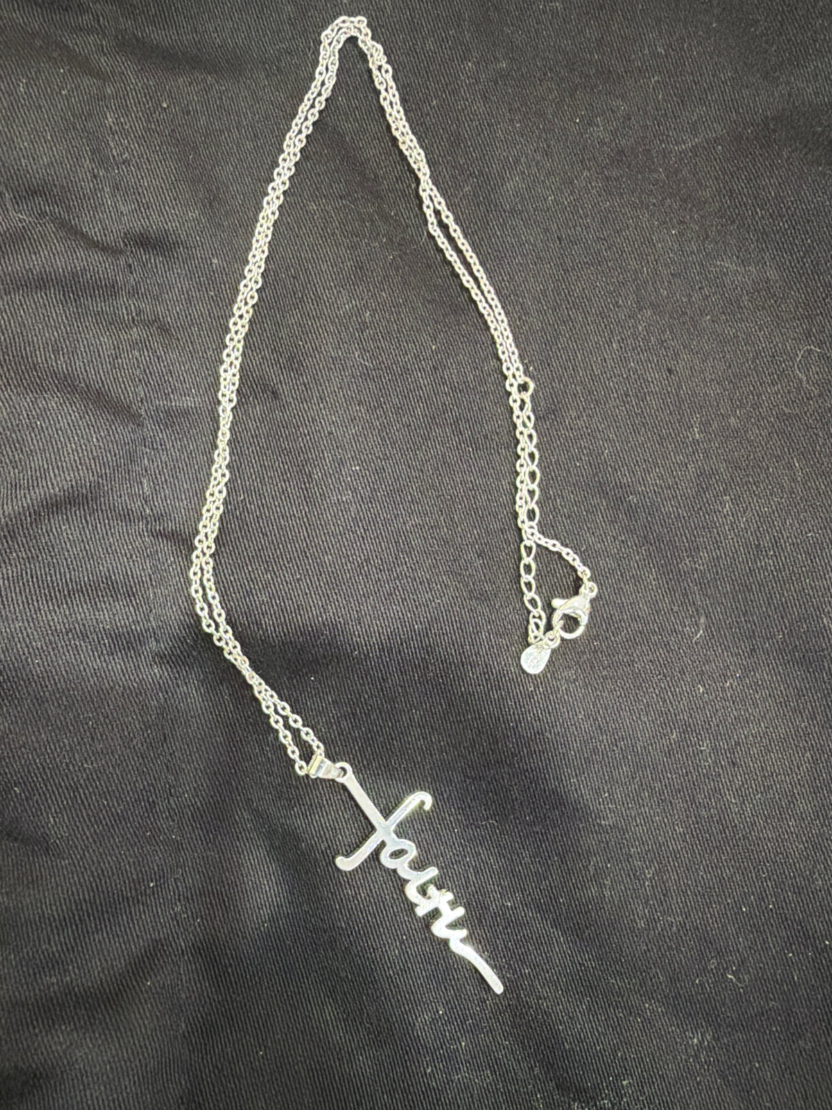 S925- Cursive script "Faith" cross necklace, which is a popular design where the word "Faith" is integrated into the shape of a Christian cross