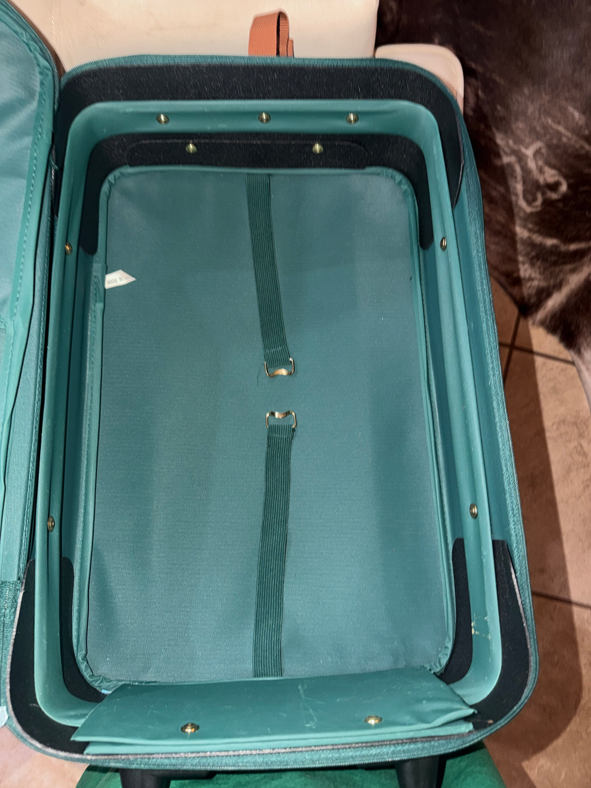 Vintage 1980s Polo Ralph Lauren green canvas roller suitcase.