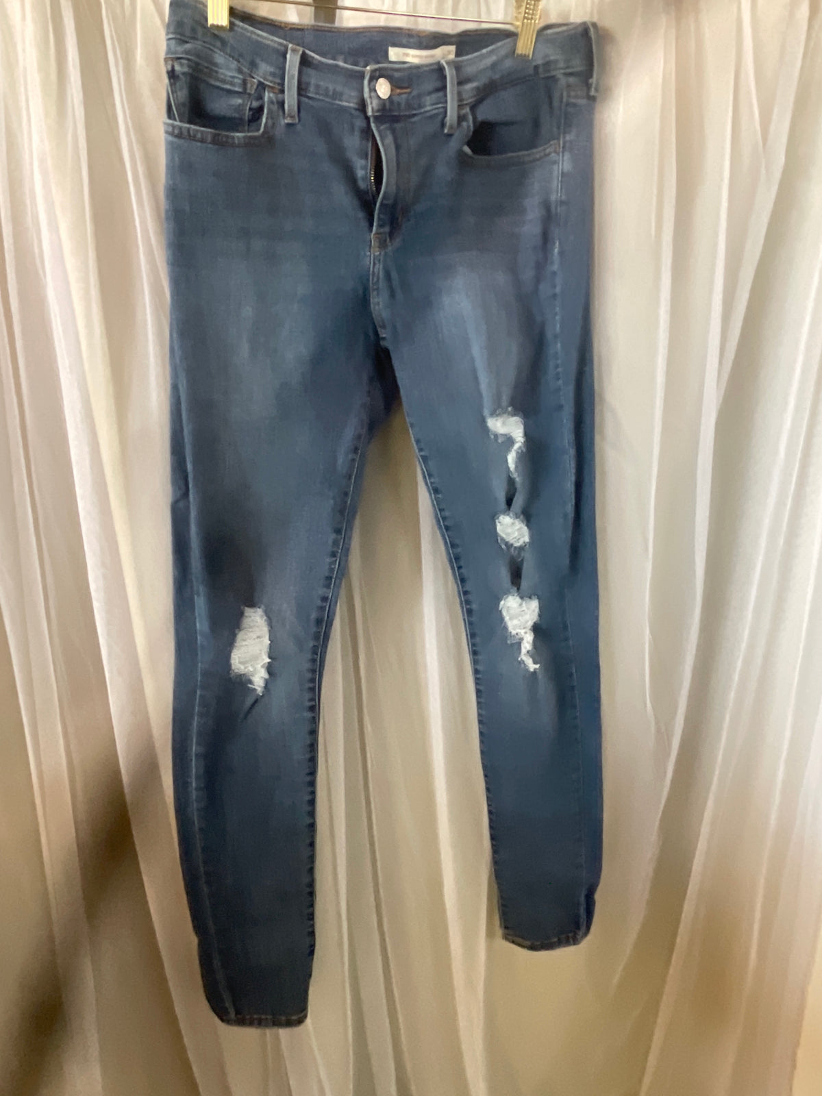 Levi's 710 Super Skinny Distressed Jeans,