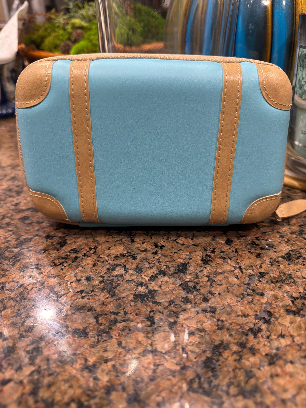 ANA Airlines × Globe-Trotter Business Class amenity kit with travel products.