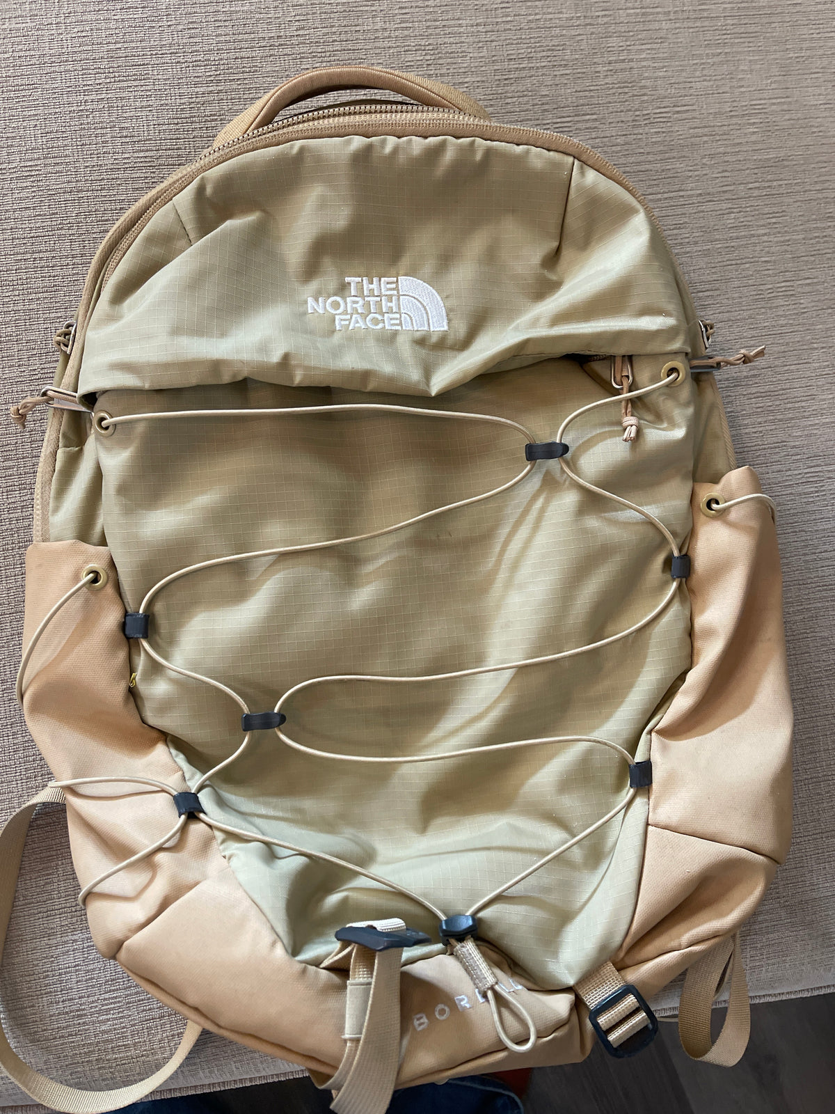 The North Face Borealis Backpack in the Khaki Stone colorway.