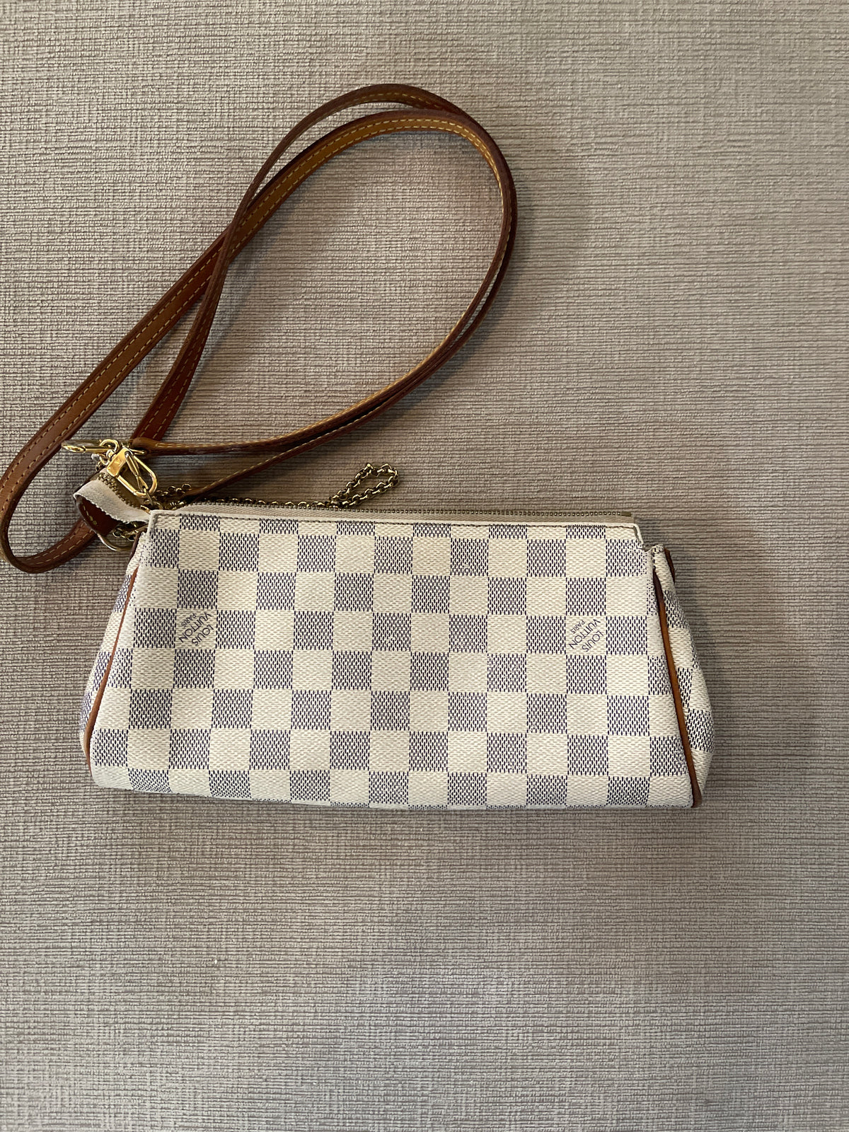 Louis Vuitton Damier Azur Eva Clutch.