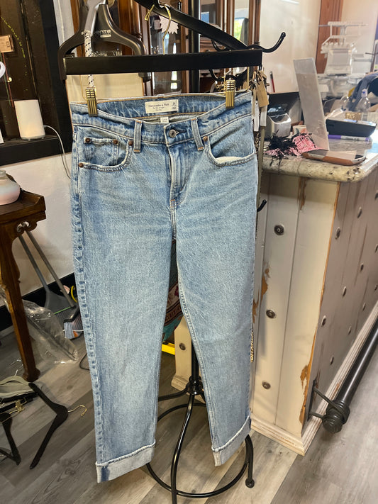 These light-wash cuffed straight-leg jeans by Abercrombie & Fitch feature a classic high-rise fit and a relaxed silhouette.