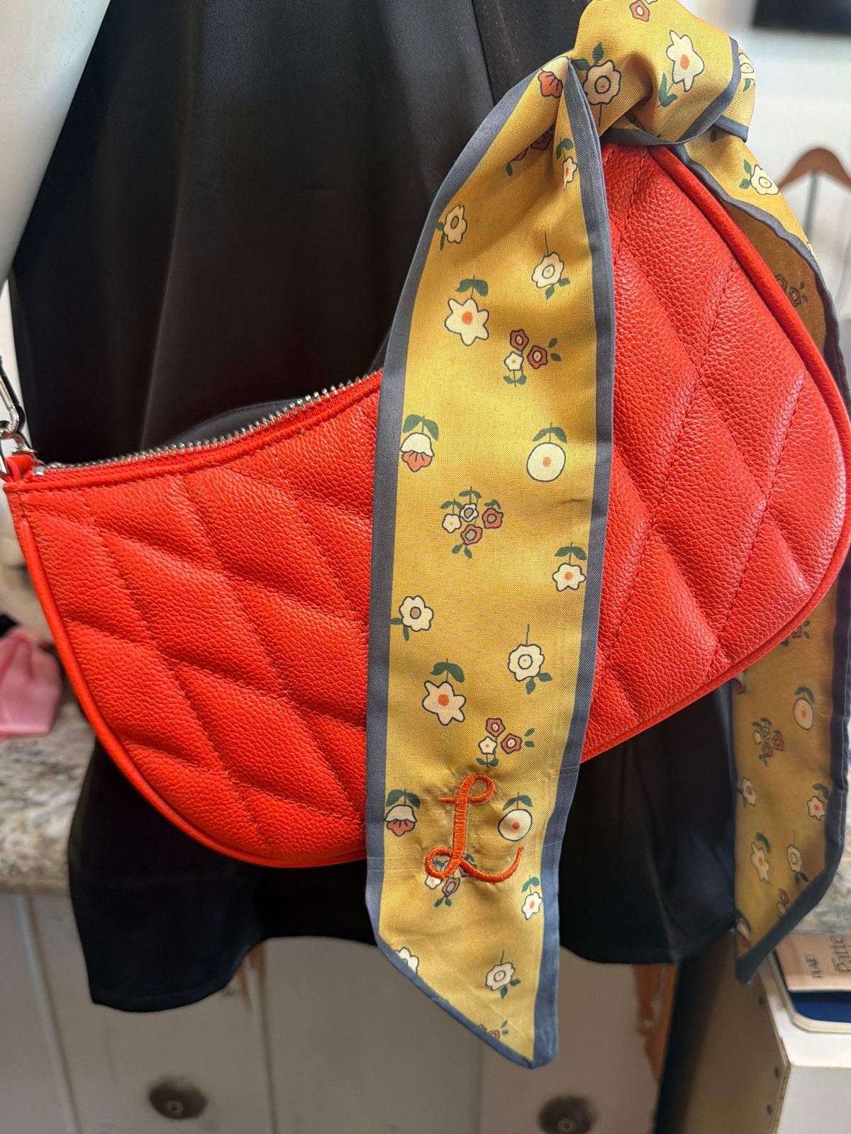 Scarf with a embroidered initial