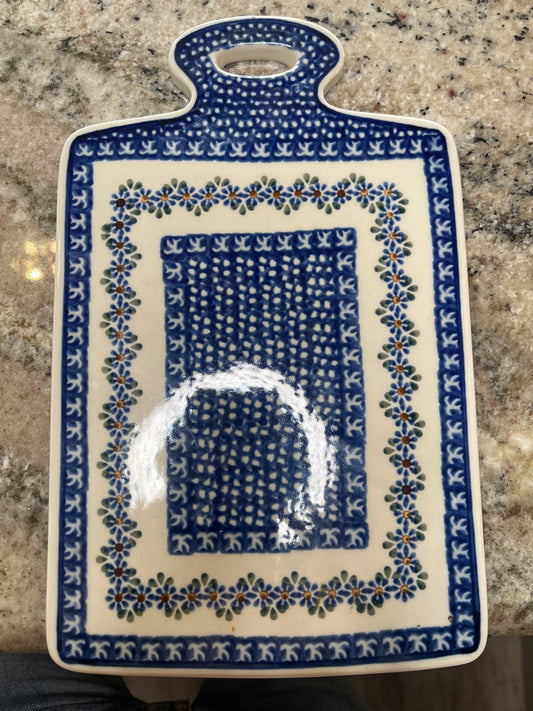 Polish pottery cheese board or serving tray, hand-painted in Bolesławiec, Poland, featuring a blue and white floral pattern. 411