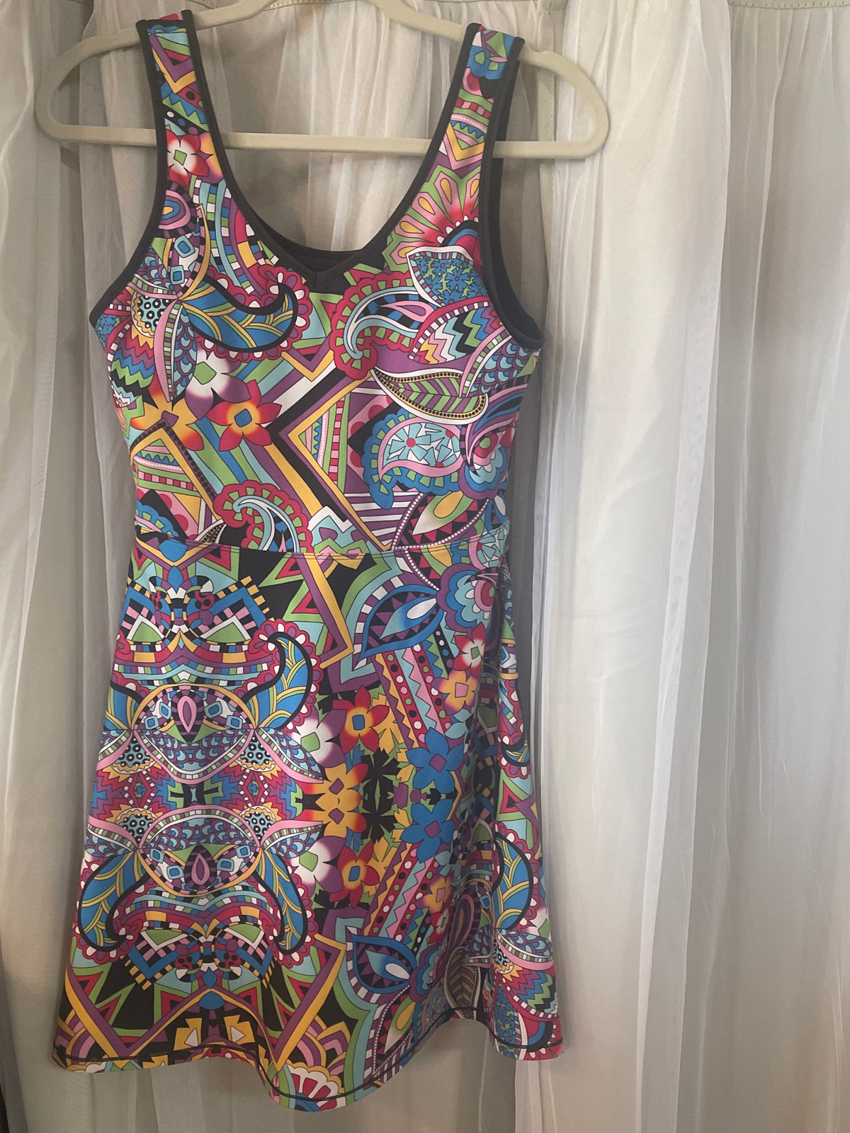 the Johnny Was Bee Active Scoop Back Fit & Flare Tennis Dress in the vibrant "Demarne Print" pattern.