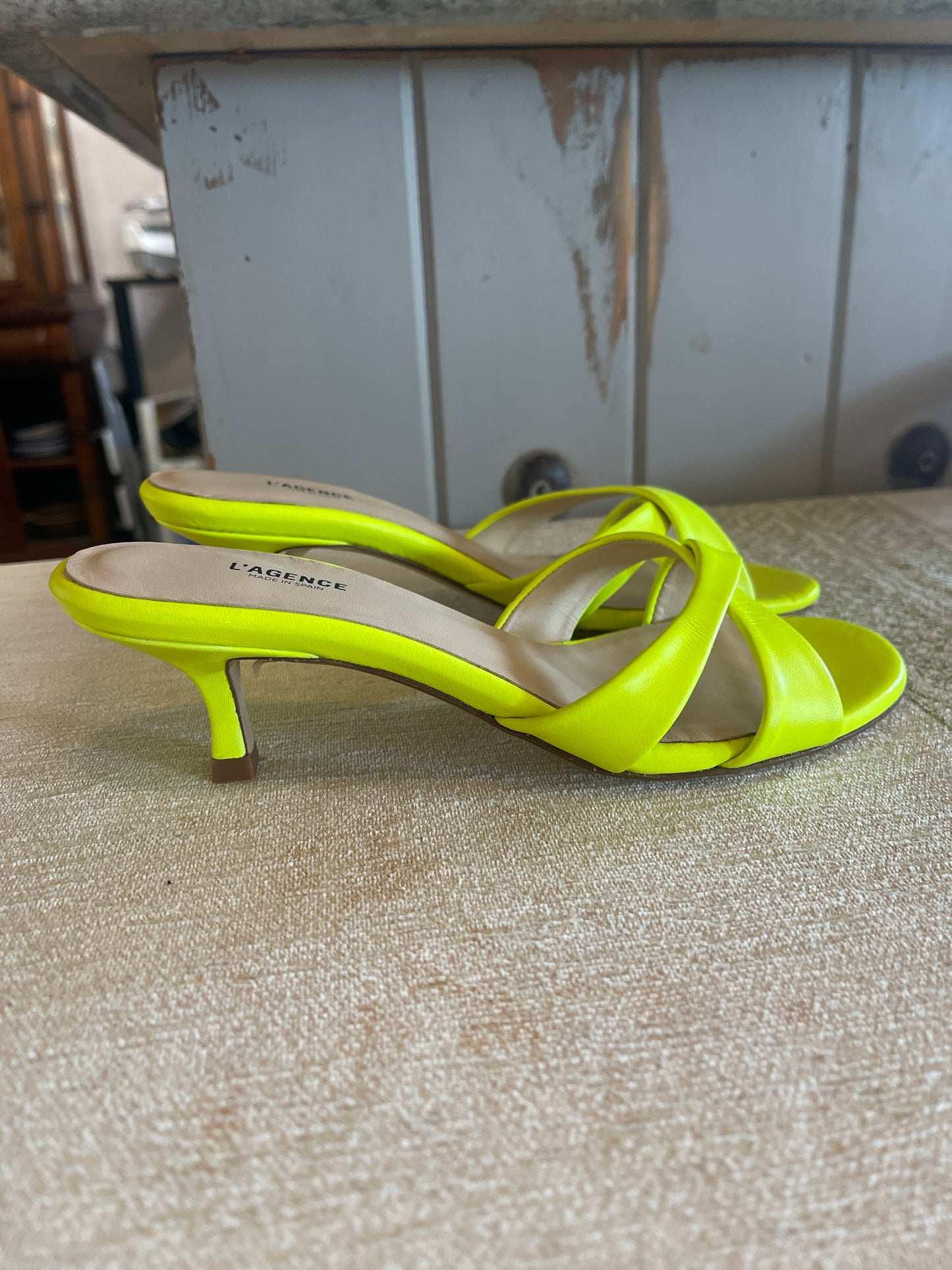 L'Agence Alesia criss-cross slide sandals in neon yellow leather