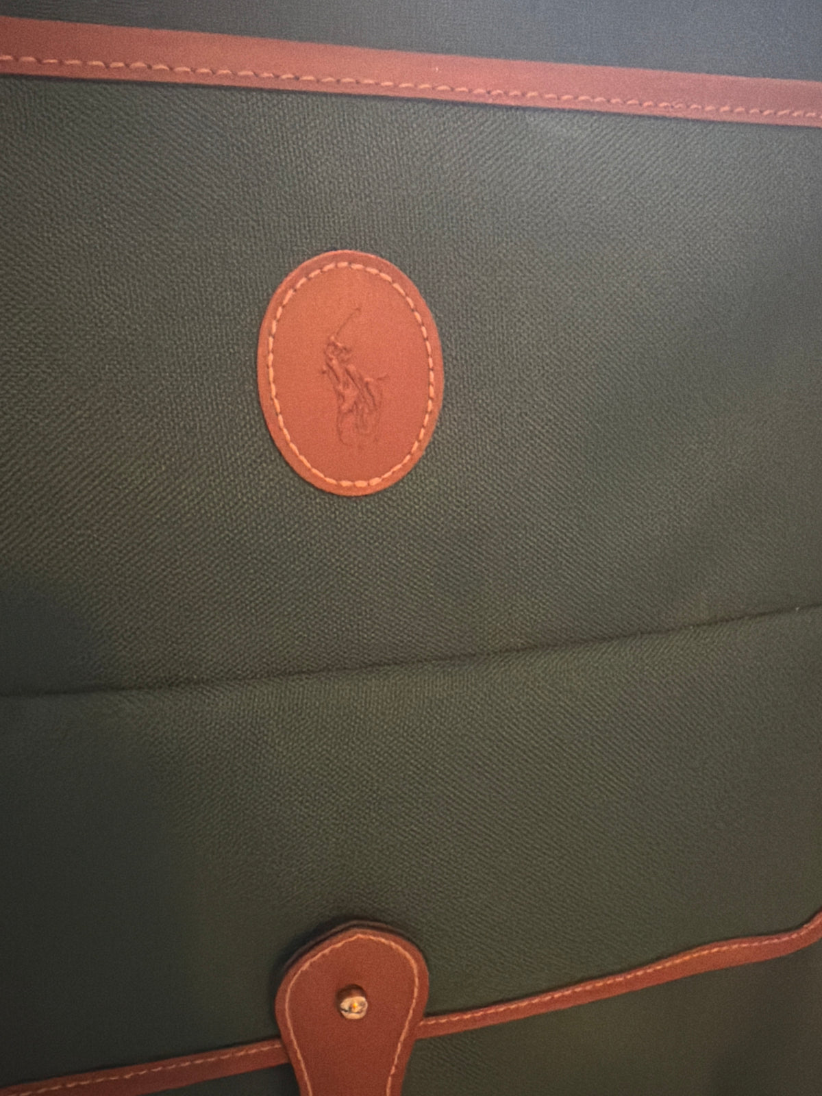 Vintage 1980s Polo Ralph Lauren green canvas roller suitcase.
