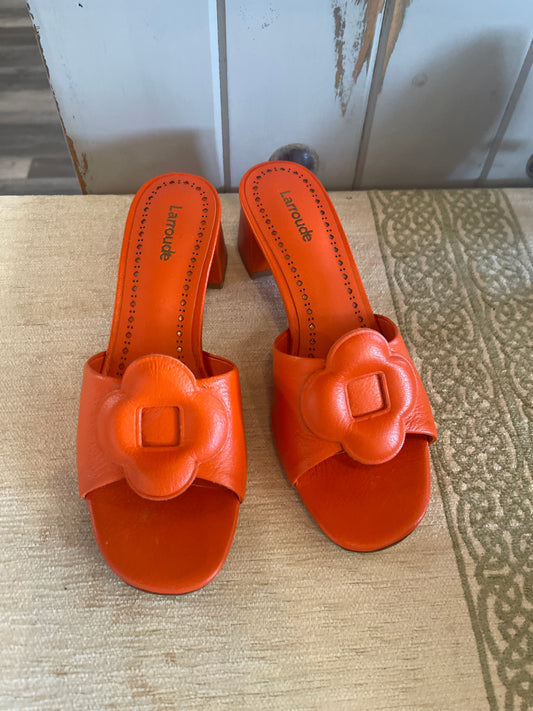 These are Larroude Flora mule slide sandals in orang
