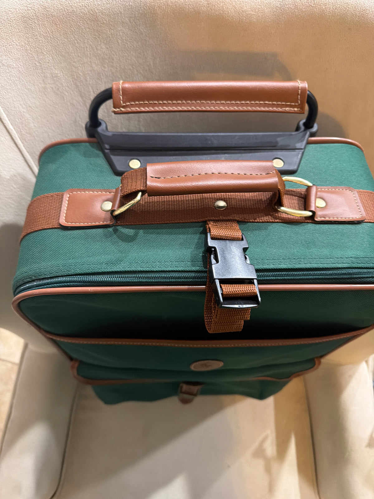 Vintage 1980s Polo Ralph Lauren green canvas roller suitcase.