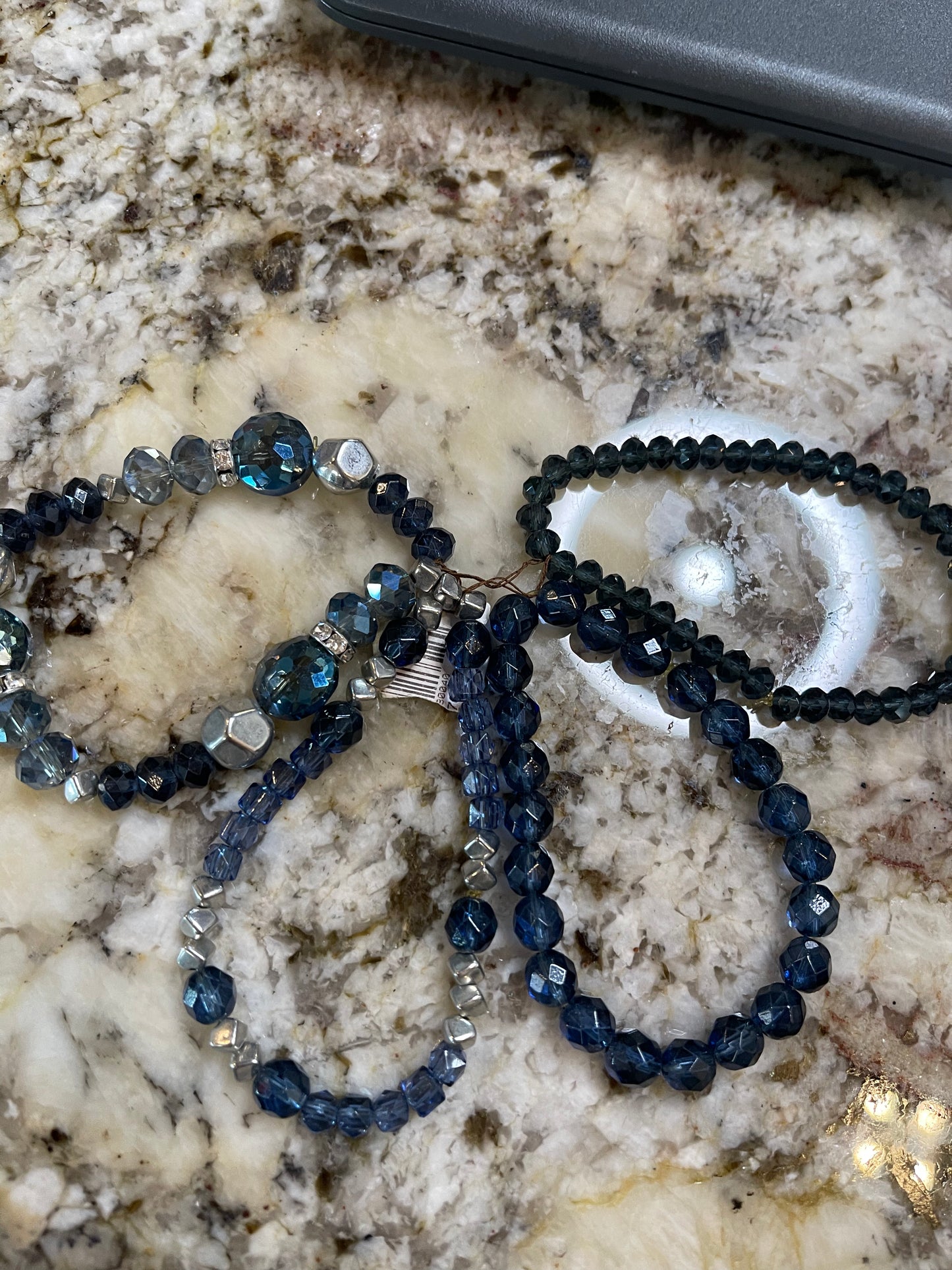 4 blue beaded bracelets